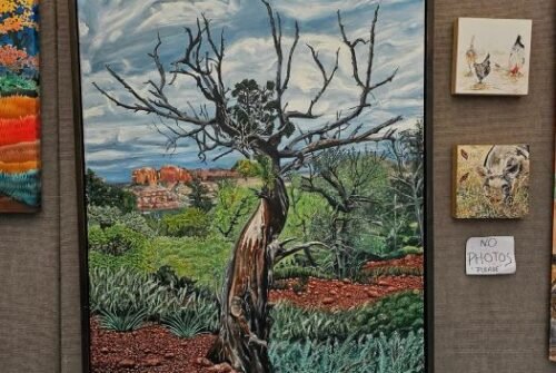 Detailed desert landscape painting by Therese Tice Art featuring a weathered tree, dramatic sky, and vibrant natural textures.