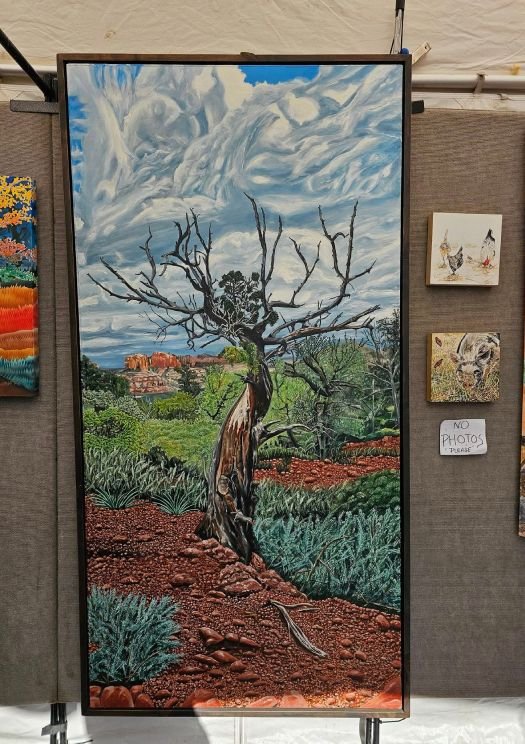 Detailed desert landscape painting by Therese Tice Art featuring a weathered tree, dramatic sky, and vibrant natural textures.